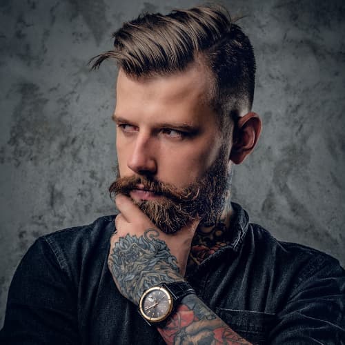 dégradé barbe homme tatoué